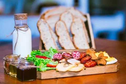 Rustic Breakfast Display with Assorted Foods Stock Photos