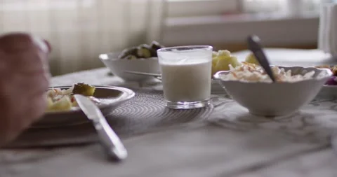 Rustic breakfast on the table in the early morning Stock Footage 147484549