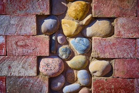 Rustic Brick and Stone Texture Close-Up from Eye-Level Perspective Foto stock