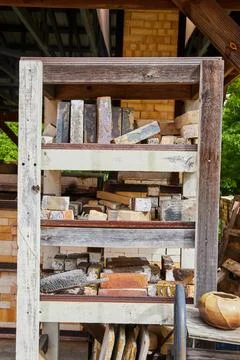 Rustic Brick Collection and Tools on Weathered Rack - Construction Theme 写真素材