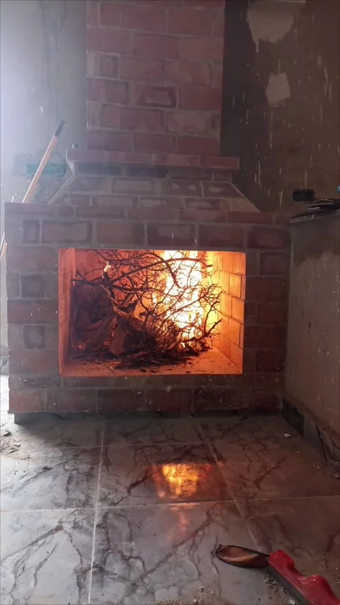 Rustic Brick Fireplace with Burning Wood and Bright Orange Flames Stock Footage 334345102