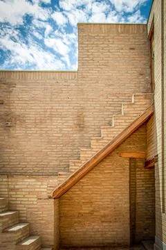 Rustic Brick Staircase Against a Clear Sky Stock Photos