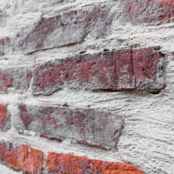 Rustic brick wall Rustic brick wall, texture of red stone blocks closeup. ... Stock-Fotos