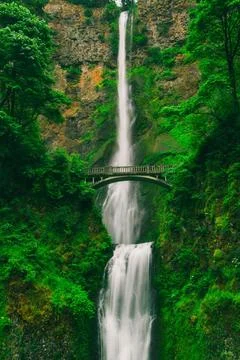 Rustic Bridge Near a Waterfall Stock Photos