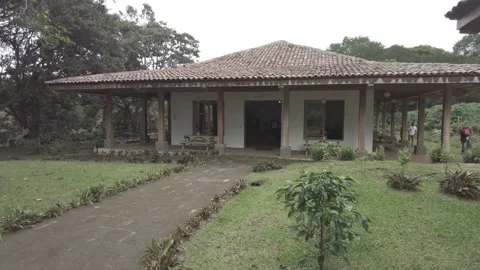Rustic building with a tiled roof surrounded by nature in Costa Rica Stock Footage 168396606