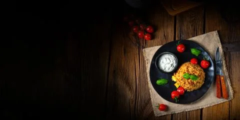 Rustic bulgur fried with minced meat and vegetables Stock Photos