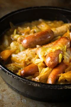 Rustic cabbage stew with sausage Stock Photos