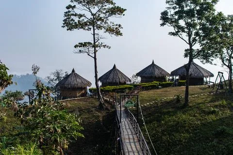Rustic cabin overlooking cloudy Sajek valley Stock Photos