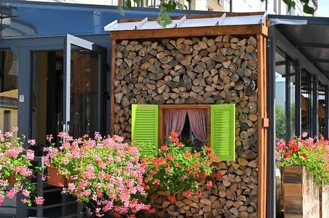 A rustic cafe with green shuttered windows. 写真素材