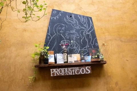 Rustic cafe interior with artistic chalkboard drawing and Products of Friends 写真素材