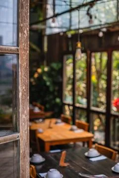 Rustic Cafe Interior with Set Tables Stock Photos