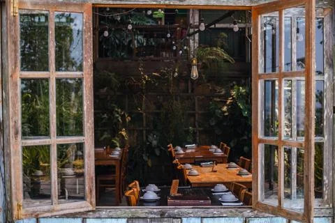 Rustic Cafe Interior with Set Tables Stock Photos