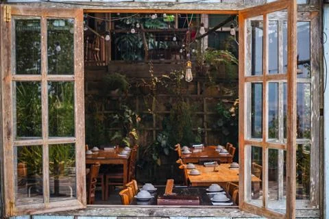 Rustic Cafe Interior with Set Tables Stock Photos