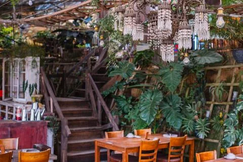 Rustic Cafe Interior with Set Tables Stock Photos