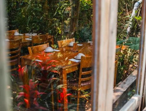 Rustic Cafe Interior with Set Tables Stock Photos
