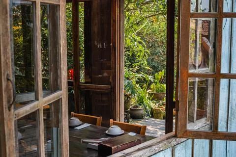 Rustic Cafe Interior with Set Tables Foto stock