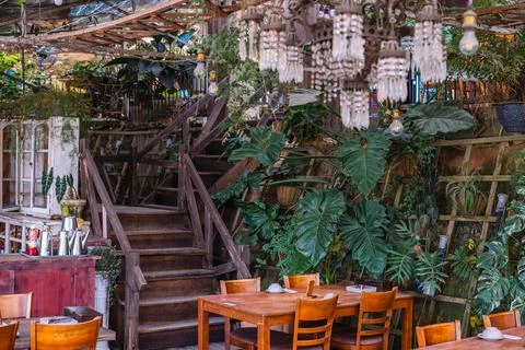 Rustic Cafe Interior with Set Tables Stock Photos