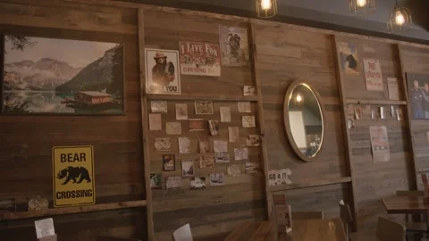 Rustic Cafe Interior with Wooden Walls, Vintage Decor, and Diners in Sydney Stock Footage 345673548