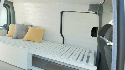 Rustic Camper Van Interior With Customized Wooden Seat And Pillows. - Stock Footage 159118695