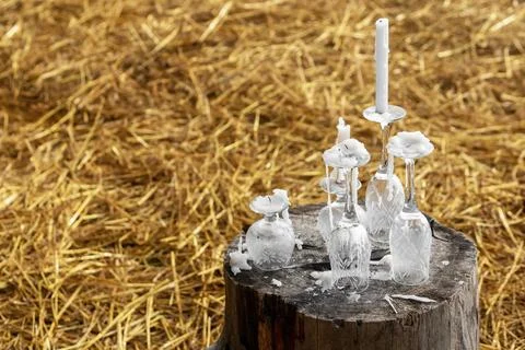 Rustic candles in elegant glass candlesticks Stock Photos