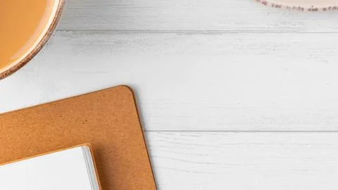Rustic ceramic plates and white tabletop flat lay Stock Photos