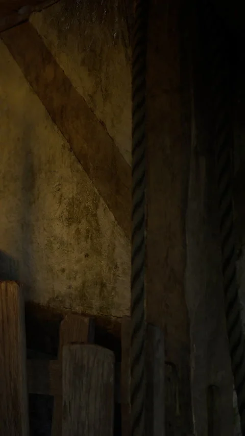 Rustic charm captured in an old barn with weathered beams and thick rope Stock Footage 331807383