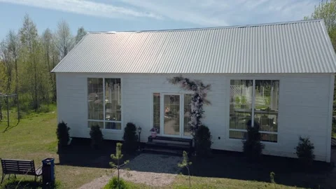 Rustic Charm, Countryside Wedding Place with White Blooms. Aerial Drone shot. Stock Footage 257767141