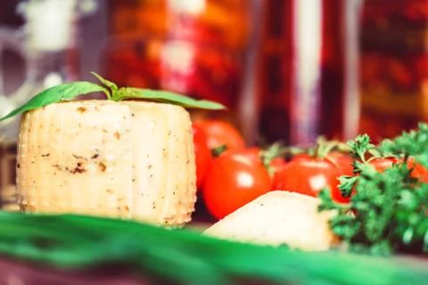 Rustic cheese with herbs and vegetables Foto stock