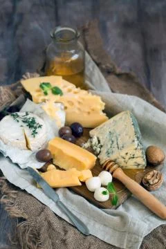 Rustic cheese platter Stock Photos