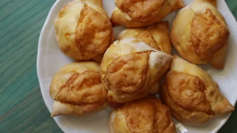 Rustic with cheese. Typical panzerotti from southern Italy Stock Footage 153804356