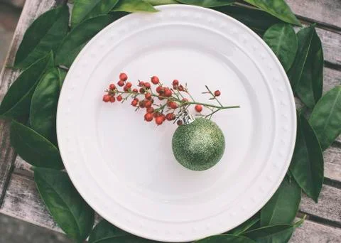 Rustic Christmas setting with Glitter Green Ornament Stock Photos