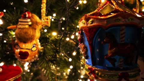 Rustic Christmas tree decorations hanging on a blurred background Christmas tree Stock Footage 289545231