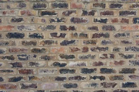 Rustic Clay Brick And Mortar Wall Stock-Fotos