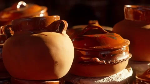 Rustic Clay Cooking Pots and Mexican Ceramic Kitchenware at Artisan Market Stock Footage 333290555