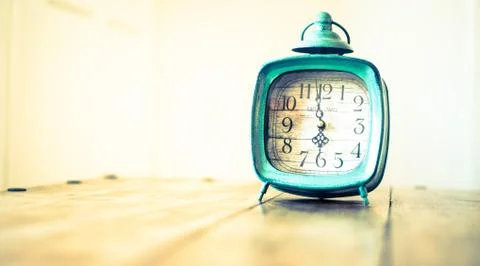 Rustic clock - vintage old fashioned clock Stock Photos