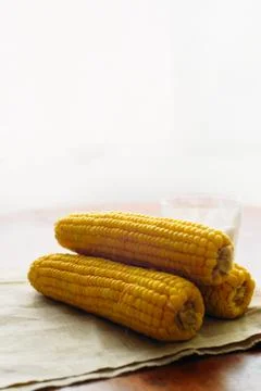 Rustic concept just cooked corn with salt on table Stock-Fotos