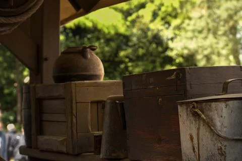 Rustic containers and wooden boxes displaying vintage items Stock Photos