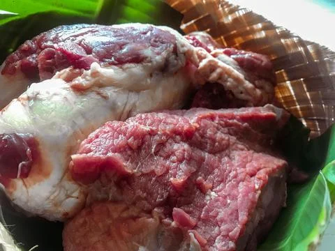 Rustic Cooking Concept: Fresh Beef on Banana Leaf Stock Photos