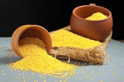 Rustic Cornmeal Spill from Clay Pots Stock Photos