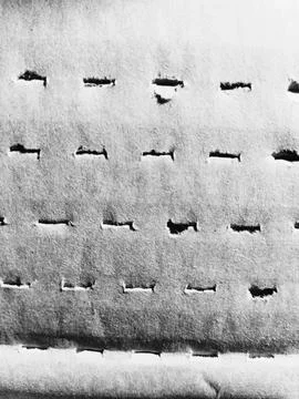 Rustic corrugated cardboard slotted pattern background Stock Photos