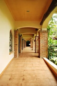Rustic courtyard hallway Stock Photos