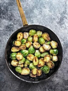 Rustic crispy fried brussels sprouts Stock Photos