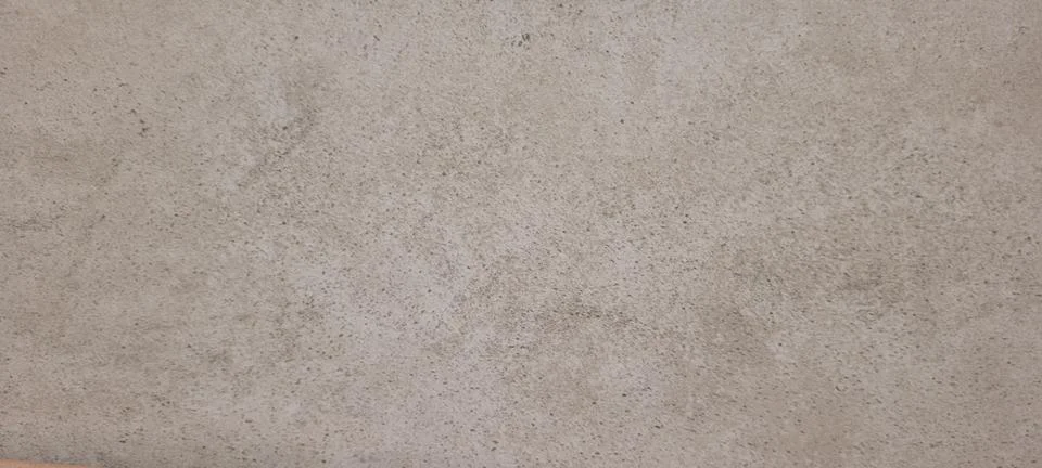 Rustic dark background with gray burnt cement floor texture Stock Photos