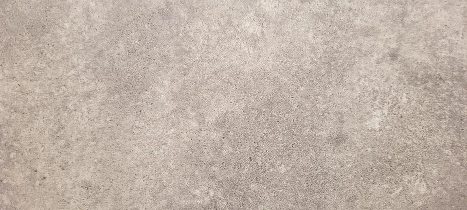 Rustic dark background with gray burnt cement floor texture Stock Photos