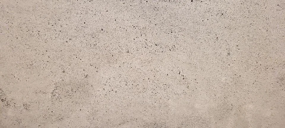 Rustic dark background with gray burnt cement floor texture Stock Photos