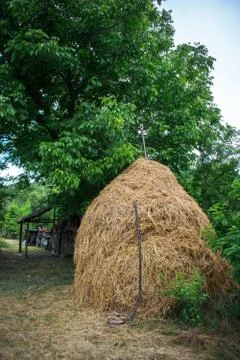 Rustic decor at the peasant farm. The haystack Stock Photos