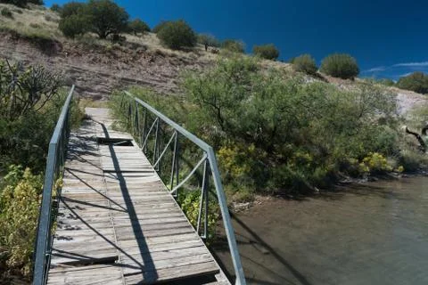 Rustic dock view at Bill Evans lake, New Mexico. Stock Photos