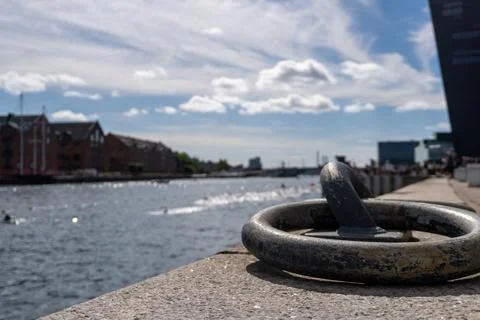 Rustic Dockside with Cityscape in Background Stock Photos