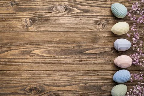 Rustic Easter background with pastel eggs 写真素材