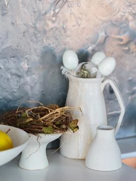 Rustic Easter Display with Nest and Decorated Eggs Stock Photos